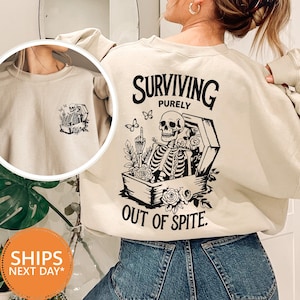 Surviving Purely Out of Spite Sweatshirt, Funny Goth Skeleton Hoodie, Celestial Skeleton Crewneck, Gothic Boho Pullover, Cozy Goth Hoodie