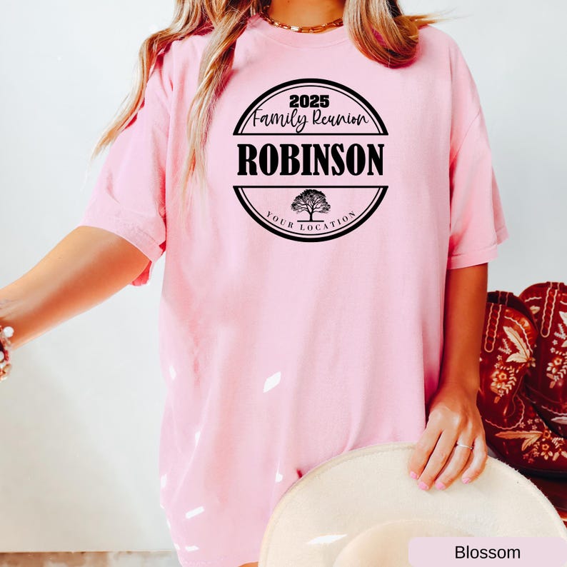 a woman wearing a pink shirt and hat