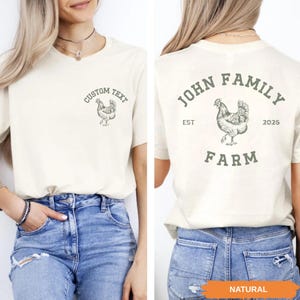 A woman wearing a white t-shirt with a graphic of a chicken and the text "John Family Farm" printed on it.