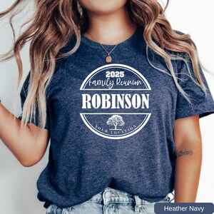 a woman wearing a t - shirt that says robinson