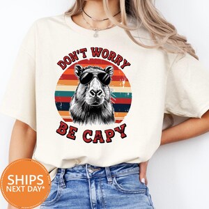 Funny Capybara Shirt, Don’t Worry Be Cappy Tee, Vintage Capybara Graphic T-Shirt, Capybara Lover Comfort Colors Gift Tee, Animal Pun Shirt