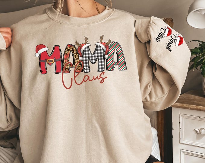 Custom Mama Claus Sweatshirt and Hoodie, Christmas Grandma Claus shirt,Gift for Mom,Custom Gigi Sweatshirt with Children Name on Sleeve