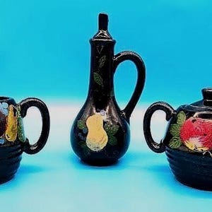 Vintage Japanese Ceramic Set - Black Glaze, Hand-Painted Fruit Design, Includes Creamer, Sugar Bowl, and Vinegar Decanter