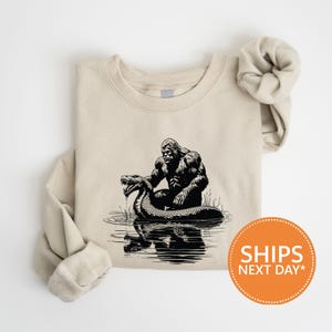 Funny Bigfoot Crewneck, Loch Ness Hoodie, Vintage Sasquatch Pullover, Cryptidcore Sweatshirt, Retro Outdoor Graphic Top