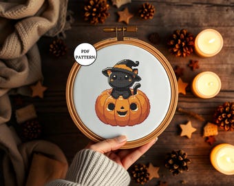 黒猫とかわいいカボチャ、クロスステッチのパターン、ハロウィンの友達