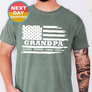 USA Flag Grandpa Shirt with Grandkids Names, Personalized Comfort Colors Tee, Father’s Day Gift for Grandpa, Patriotic Grandpa Shirt