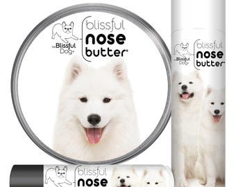 Mantequilla para nariz de samoyedo® elaborada artesanalmente en Minnesota con bálsamo totalmente natural para narices de perro secas o con costras. Latas y tubos con etiqueta Samoyed