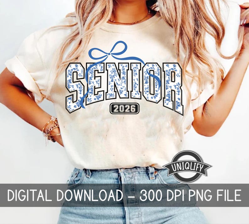 May include: White t-shirt with a blue floral pattern and the text "Senior 2026" in blue with a blue bow above the text.