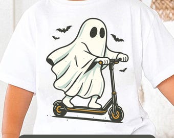 May include: White t-shirt featuring a cartoon ghost riding a black and gold scooter, with three black bats flying above. The text "High Resolution - 300 Dpi PNG" is at the bottom. A fun Halloween-themed design.
