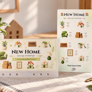 May include: A New Home Savings Challenge tracker set featuring a horizontal card and a vertical card with illustrations of household items like a house, key, plant, chair, and boxes, with text indicating savings amounts and a total saved of $150.
