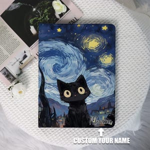 May include: A black cat with large eyes sits in front of a blue and white starry night painting. The painting is reminiscent of Vincent van Gogh's "Starry Night". The text "Monica" is written in white at the bottom of the image.