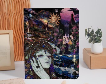 May include: A rectangular notebook cover featuring a collage of surreal imagery, including a pale-skinned figure with ornate headwear, a golden sun face, a starry galaxy, a waterfall, and a group of small figures in pointed hats.