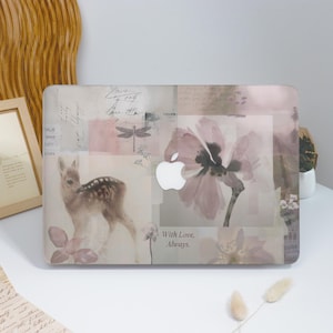 May include: A clear laptop case with a collage design featuring a deer, dragonfly, and floral elements in soft pink and beige tones. The case has the Apple logo and the text "With Love, Always."
