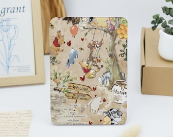 May include: A vintage-style illustration featuring Winnie the Pooh and his friends from the Hundred Acre Wood. The characters are depicted in various poses, including swinging on a vine, holding a honey pot, and walking through the forest. The illustration is set against a background of a forest scene with trees, flowers, and a sign that reads "Welcome Hundred Acre Wood".