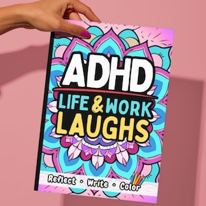 May include: A colorful notebook with the text "ADHD LIFE & WORK LAUGHS" in bold letters. The cover features a mandala design in shades of pink, blue, and purple. The bottom of the notebook reads "Reflect • Write • Color" with colored pencils.