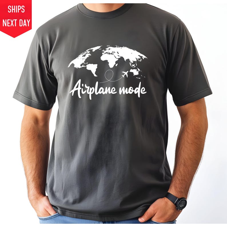 a man wearing a t - shirt that says airplane made