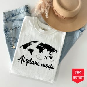 a t - shirt with the words airplane mode on it
