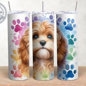 May include: Three stainless steel tumblers with colorful paw prints and a watercolor-style image of a brown and white dog. The tumblers are a great way to show your love for dogs.