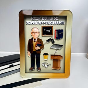 May include: A framed image featuring a cartoon professor, with the text "DAVID HARRISON UNIVERSITY PROFESSOR." The image includes a chalkboard with E=mc², books, a laptop, a coffee cup, glasses, car keys, and a podium.