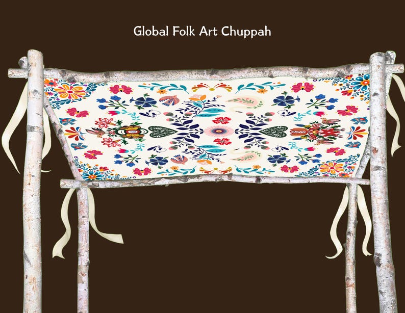 May include: A Global Folk Art Chuppah with a cream-colored fabric canopy adorned with colorful floral patterns in red, blue, and orange. The canopy is supported by birch poles and tied with cream-colored ribbons.