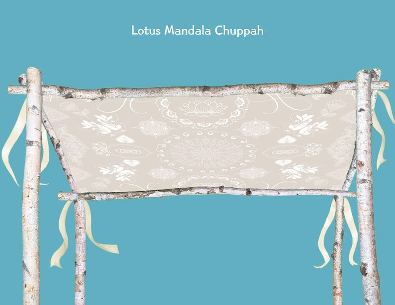May include: A beige fabric chuppah with a lotus mandala design, supported by birch poles. The chuppah has cream-colored ribbons tied to the poles. The text "Lotus Mandala Chuppah" is at the top.