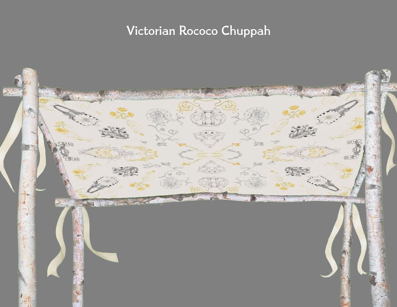 May include: A Victorian Rococo Chuppah with a cream-colored fabric canopy. The canopy is adorned with a repeating pattern of black and yellow floral and abstract designs. The chuppah is supported by birch poles and cream-colored ribbons.