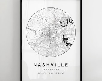 Może przedstawiać: Czarno-biały wydruk mapy Nashville w stanie Tennessee z nazwą miasta i współrzędnymi. Mapa znajduje się w okrągłej ramie i jest wydrukowana na białym papierze.