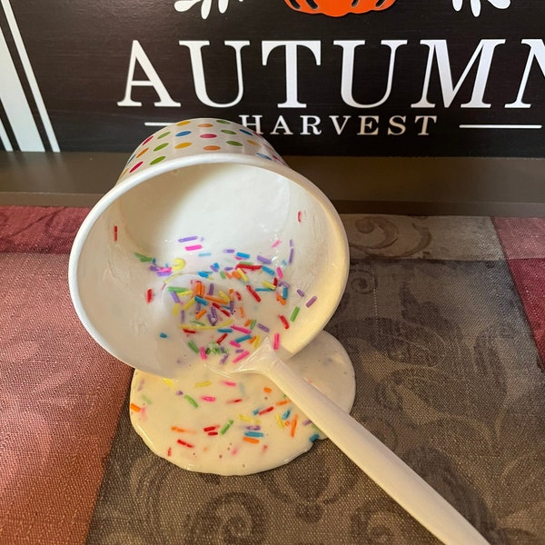 Paper Cup of Spilled Melting Vanilla Ice Cream With Sprinkles White Plastic Straw Fake Food Photo Prop Staging