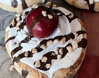 One Frosted Dessert Roll, Whipped Cream, Cherry & Nuts Fake Food Photo Prop