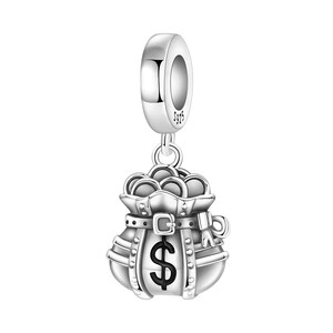 May include: A silver charm featuring a money bag design. The bag is filled with coins and has a large dollar sign on the front. The charm is made of shiny metal and has a loop at the top for attaching to a bracelet or necklace.