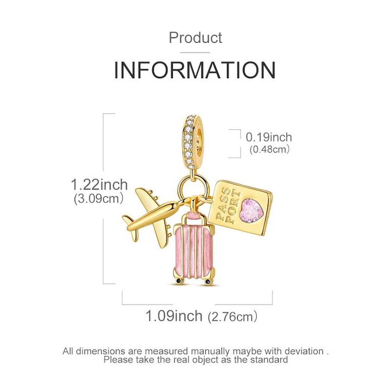 May include: A gold-colored charm with a travel theme. It features a small airplane, a pink suitcase, and a passport with a heart-shaped gem. The charm is 1.22 inches (3.09cm) long and 1.09 inches (2.76cm) wide.