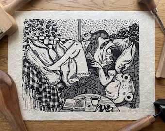 Rainy Afternoon | Linocut Relief Print of Woman Reading with Cat on A Rainy Day