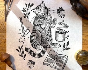 Creature Comforts | Linocut Block Relief Print of Cat with Coffee & Book