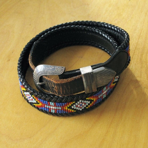 Leather and beaded belt. Size 32.