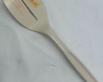 Espátula ranurada de nailon plástico Foley vintage para voltear panqueques, alternativa a la mantequilla PHASE