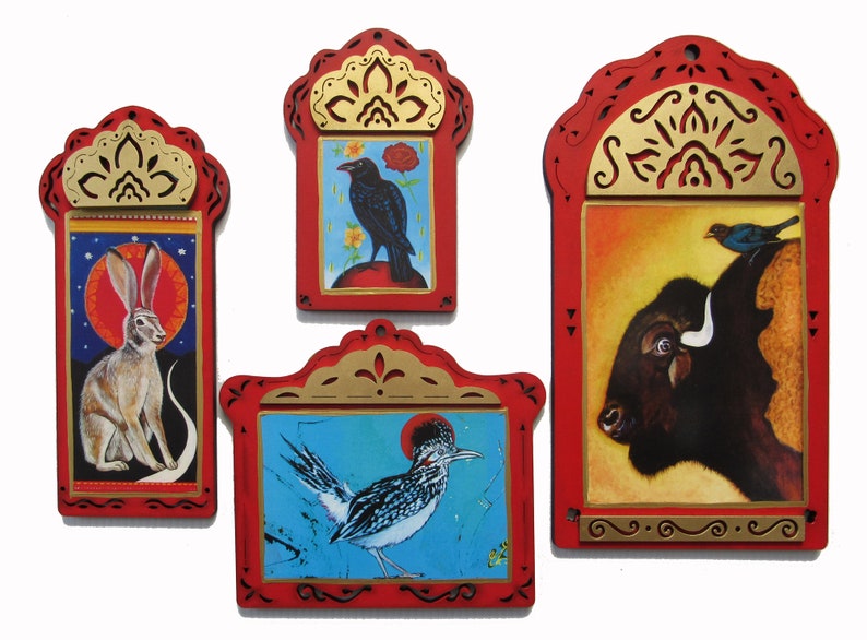 May include: Four framed, hand-painted illustrations of animals. The frames are red with gold accents. The illustrations depict a jackrabbit, a crow, a roadrunner, and a bison with a bluebird perched on its back.