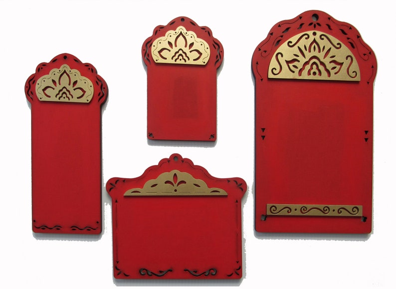 May include: Four red wooden signs with gold decorative accents. The signs have a scalloped top and a decorative border. The signs are blank and ready to be personalized.