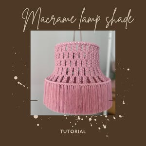 May include: A pink macrame lampshade with a fringe bottom. The lampshade is hanging from a ceiling fixture. The image includes the text "Macrame lamp shade" and "TUTORIAL".
