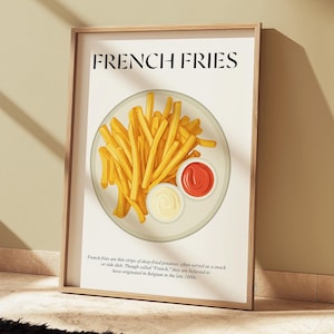 Könnte beinhalten: Ein gerahmter Druck mit der Aufschrift "FRENCH FRIES" oben, der eine Illustration von goldenen Pommes Frites auf einem Teller mit Ketchup und Mayonnaise zeigt. Der Druck befindet sich in einem Holzrahmen.