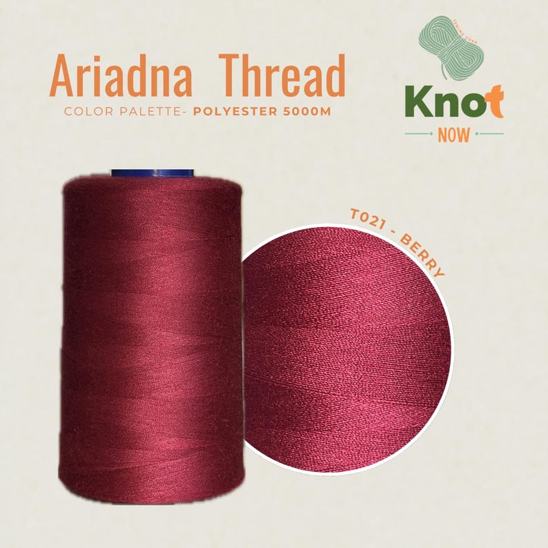 May include: A large spool of deep berry red Ariadna polyester thread. The text on the image reads Ariadna Thread, Knot Now, and T021 - BERRY. The spool contains 5000M of thread, and a circular inset shows a close-up of the dark red thread texture.