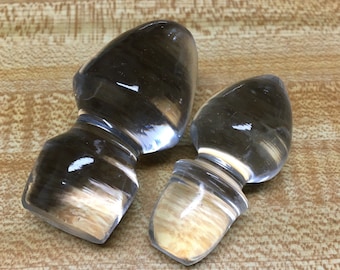 Two glass stoppers, 2”