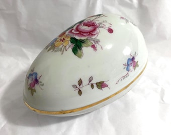 Shackman, Egg-shaped, decorated porcelain dish, gold trim, 5 5/8” L, 1960-70s