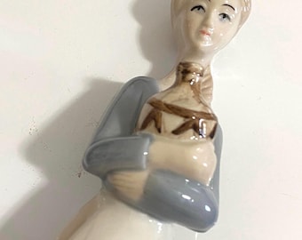 Woman with water jug, Porcelain figurine, 1977, Spain