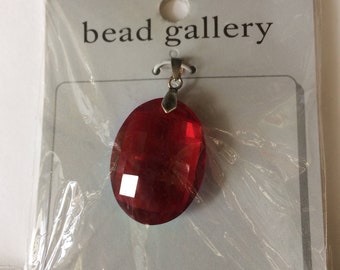 32 x 24 mm, Ruby faceted, Oval, Glass Pendant