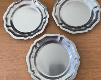 Three Stainless Steel 5.5” diameter plates