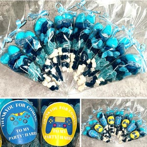 May include: Blue and white candy filled cones with a yellow and blue gamer controller sticker that says "Thank you for coming to my party! Harry".