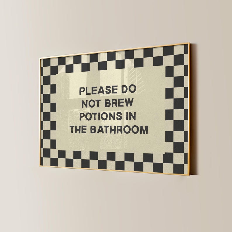 Cute witch Halloween bathroom sign with a funny potion brewing message for spooky season decorating. This witchy wall art is ideal for kids Halloween bathroom decor, children’s Halloween parties, witch themed party decorations, and potion party decor. A whimsical way to decorate a bathroom for Halloween with magical witch decor, funny bathroom decor, fall decorations, and playful kid friendly Halloween style.