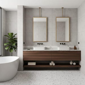 May include: A bathroom featuring a floating dark wood vanity with two white rectangular sinks, matte black faucets, and two gold-framed rectangular mirrors suspended from the ceiling. A white freestanding bathtub sits to the left.