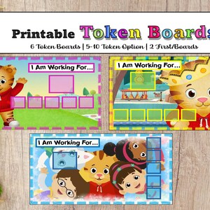 May include: Printable token boards featuring Daniel Tiger and friends. The boards have the text "I Am Working For..." and include spaces for tokens. The top banner reads "Printable Token Boards". The boards are designed for use with 6 tokens, with options for 5-10 tokens and 2 first/boards.