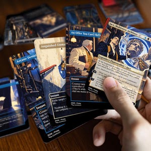 Printed Jace, Multiverse Architect · The Great Transposition Show proxy cards in hand, showing real card size, finish and illustrated artwork